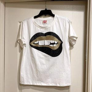 T shirt. (more made to be casual / dressed up) From sparkle city.